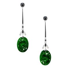 Art Deco revival jade, onyx and diamond drop dangle earrings. 2 oval carved jadeite jade dangles with black onyx, black enamel and 22 round full cut diamonds in 14k white gold. 2 oval pierced natural green Jadeite Jade, polimer GIA certificate # 2211043716 22 round brilliant cut diamonds, G SI approx. .30cts 2 round black cabochon onyx, 5.5mm 14k white gold Stamped: 585 8.1 grams Top to bottom: 73.9mm or 2 5/16 Inch Width: 17.6mm or 11/16 Inch Depth or thickness: 5.3mm Rose Gold Dangle Earrings, White Gold Drop Earrings, Art Deco Revival, Antique Wedding Bands, Diamond Sapphire Engagement Ring, Antique Engagement Rings Vintage, Antique Bracelets, Vintage Sapphire, Diamond Engagement Rings Vintage