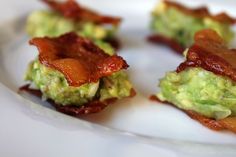 bacon and avocado bites on a white plate with text describing the ingredients for them