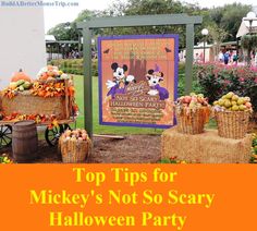 mickey's not so scary halloween party with pumpkins, apples and other decorations