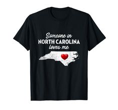 PRICES MAY VARY. Are you a proud parent, grandparent, friend, or family member in North Carolina? Then this North Carolina t-shirt is perfect. Give this North Carolina t-shirt to someone you love to let them know how much you care. Show your loved ones how much you care by giving this North Carolina t-shirt that says: Someone In North Carolina Loves Me! Makes a great gift for a son, daughter, grandchild, friend, or family member. If you're in NC then grab this shirt today. Lightweight, Classic f North Carolina Shirt, Fabric Texture, Branded T Shirts, North Carolina, Types Of Printing, Trendy Fashion, Collar Styles, Print T Shirt, Top Styles