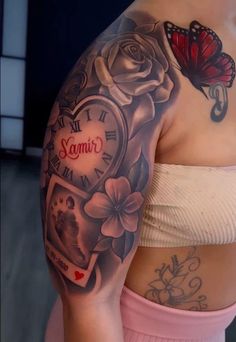 a woman with tattoos on her arm and chest