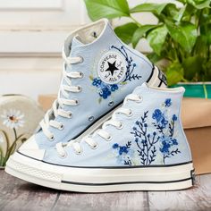 Customized Embroidered Converse Shoes, Blue Flower Embroidered Shoes Custom, Flower Embroidered Sneakers for Women, Mother's Day Gift 💚 Immerse yourself in the intricate craftsmanship as we lovingly hand embroider rustic flowers onto your chosen Converse pair 💚 🌿 The listed price encompasses both the Converse Shoes and the showcased Embroidery Designs. 1. MANUFACTURING PROCEDURE 🌿 Upon receiving your order, we initiate the shoe preparation process. If your chosen shoes are readily available Converse Shoes Blue, Custom Converse High Tops, Converse Chuck 70s, Converse High Top