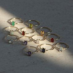 The perfect gift to give or to keep. The Solid Gold Essential Baguette Birthstone Ring was inspired by our number one selling solid gold style, now available in twelve natural gemstones; one for every birthstone. Choose you birthstone or choose your favorite gem for the perfect addition to your everyday ring stack. Family Gold is a Local Eclectic exclusive. Natural and lab created gemstones 4 x 5 mm 9k solid yellow gold Band width 1 mm January: garnet February: amethyst March: aquamarine April: white topaz May: lab created emerald June: moonstone July: lab created ruby August: peridot September: lab created blue sapphire October: Australian opal November: citrine December: lab created tanzanite Modern May Birthstone Ring With Gemstone, Minimalist May Birthstone Ring, Gemstone Stackable Rings With Baguette Cut For Gift, Yellow Gold Birthstone Ring With Baguette Cut, Everyday Fine Jewelry Emerald Birthstone Ring, Everyday Fine Jewelry Emerald Ring Birthstone, Everyday Emerald Birthstone Ring In Fine Jewelry, Everyday Baguette Cut Birthstone Jewelry, Everyday Emerald Birthstone Ring