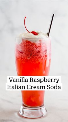 vanilla raspberry italian cream soda in a tall glass with whipped cream on top