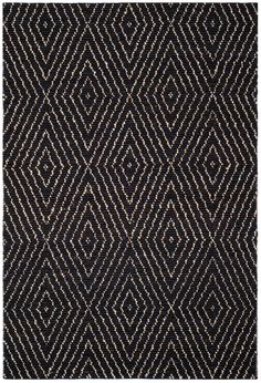 a black and white rug with diamonds on it