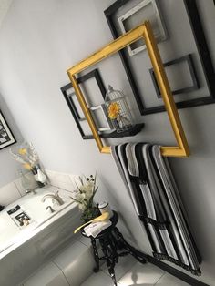 the bathroom is decorated in black and white