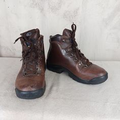 Nice pair of Vasque hiking boots made in Italy. Women's size 7 1/2. Brown leather uppers with a Gore-Tex lining because it's waterproof. Synthetic soles. Padded leather around the opening of the boot for comfort as well as a padded tongue. Six rows of laces holes and hooks. Condition is good. Leather is very nice. Some wear on the soles....see picstill lots of life left. Laces are good. Insides are clean. Make sure to see all the pictures so you can best decide. Leather Hiking Boots, Grand Junction, Gore Tex, Boot Shoes Women, Hiking Boots, Brown Leather, Leather Upper, Shoe Boots, In Italy