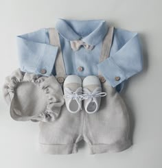 "NEW! It must be a perfect day Linen summer set for a boy    -------->Standard Outfit ( Bodysuit, Shorts,Bow tie ) <------ *  linen bodysuit. Beautiful, blue, classic. Long sleeve. Fastened with wooden buttons. Extremely soft and delicate *  linen beige shorts. Practical, comfortable, convenient.   Made of the highest quality materials, with attention to every detail. Our bestseller and must have this season. Suspenders, adjustable elastic band at the back. Finished and coconut wood buttons & cute pockets * linen bow tie * linen white sneakers or white moccasins * linen cap If you want a set for 0-12 months for example Shirts, pants, bow tie and shoes are options for you \" Outfit add shoes\" Sets for 12-18 months and 18-24 months are without shoes Shoes available in sizes 10 centimeters 1 Baby Boy Dressy Outfit Infants, Light Blue Formal Sets For Summer, Toddler Suit, Baby Boy Linen, Bodysuit Shorts, Toddler Suits, Linen Outfit, Coconut Wood, Baby Boy Dress