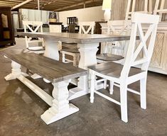 a white table and chairs in a room