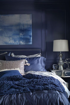 Midnight blue walls provide a tranquil, starry-night feel, perfect for unwinding after a long day. This shade promotes relaxation and can help improve sleep quality. Learn about decorating with midnight blue here. Indigo Bedroom, Midnight Blue Walls, Dark Bedroom Aesthetic, Bedroom Aesthetic Ideas, Bedroom Board, Blue Bedrooms, Navy Blue Bedrooms, Comfy Bedroom, Dark Bedroom