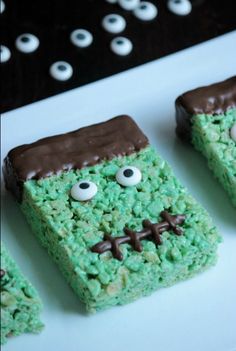 four green rice krispy treats with eyes and noses