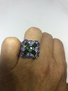 Deep green Chrome Diopside and Tanzanite 925 Sterling silver with rhodium finish Size 8 Can be re sized for a jeweler's fee of $10 All rings are shipped in a nice gift box. Check out our over a THOUSAND great reviews Engraving is $4 per letter and is not always perfect depending on the piece. It can take a few days if the jeweler is busy. This is payable to Paypal Judithsltd@gmail.com Green Multi-stone Gemstones For Anniversary, Green Multi-stone Gemstones For Gift, Green Sterling Silver Gemstones With Accent Stones, Sterling Silver Multi-stone Green Emerald Ring, Green Multi-stone Emerald Ring In Sterling Silver, Green Multi-stone Sterling Silver Rings, Green Tanzanite Multi-stone Jewelry, Pyramid Eye, Gothic Ring