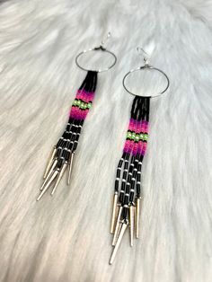 These gorgeous earrings are mvskoke-made, punk-inspired earrings in the Deadly Collection. We are an Indigenous-owned and operated business based in Mvskoke Territory in Oklahoma and strive for designs and products that are quality, affordable, and unique. We are always taking commissions and custom orders & send regular updates and confirmations because it's important to us that we are bringing your ideas to life. Most custom orders can be completed and shipped in five days, but this may vary d Nickel Free Punk Style Earrings, Trendy Black Earrings For Festivals, Handmade Edgy Plug Earrings For Gift, Nickel Free Punk Earrings For Festivals, Punk Style Handmade Earrings For Party, Handmade Edgy Plug Earrings As Gift, Trendy Festival Earrings With Ear Wire, Trendy Pierced Earrings For Festivals, Trendy Single Earring For Festivals