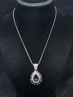 "Silver Tone Snake Chain Necklace With Purple Teardrop Pendant. There are no hallmarks on it. It has a lobster clasp. The necklace is adjustable from 16\" to 19\" The pendant measures: 1\" wide X 1 5/8\" It comes with a gift box. (Jewelry # 4295) USA Seller!! Estate sale find. We do not Clean or Polish our Estate Jewelry we will leave that to you. We also have Jewelry, Hallmark Ornaments, Dept 56, Vintage Glassware and many other items. We will combine shipping for multiple items if possible. Features: * Snake Chain Size: Womens Adjustable from 16\" to 19\" Condition: Pre-Owned Like New" Formal Teardrop Chain Necklace With Adjustable Chain, Formal Teardrop Chain Necklace, Metal Teardrop Drop Necklace, Teardrop Jewelry With Adjustable Chain For Formal Occasions, Formal Teardrop Jewelry With Adjustable Chain, Teardrop Drop Necklace With Adjustable Chain For Formal, Formal Chain Necklace With Teardrop Pendant And Adjustable Chain, Formal Teardrop Drop Necklace With Adjustable Chain, Teardrop Costume Jewelry Necklace For Formal Occasions