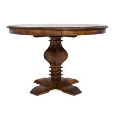 a round wooden table with two pedestals on each side and an oval shaped top