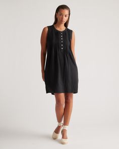 With an effortless look and flowy shape, our 100% Organic Cotton Gauze Sleeveless Swing Dress is a must-have for your warm-weather wardrobe. Made from soft, breathable organic cotton gauze, this sleeveless dress has a comfortably relaxed fit designed to keep you cool on even the hottest summer days. Bonus: it's got pockets!  | Quince | Women's Gauze Sleeveless Swing Dress in Black, Size XL, Organic Cotton Silk Pajamas Shorts, Silk Pajama Pants, Silk Tee, Sleeveless Linen Dress, Linen Collection, Cashmere Wrap, European Linens, Silk Tank, Shell Buttons