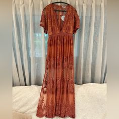 Turn Heads In This Stunning Deep-V Plunge Maxi Dress. Great Festival, Concert, Or Family Photos Dress. This Was A Boutique Find From Oo La Luxe Made By Cloud Ten. Size Medium With No Flaws, Never Got A Chance To Wear It. It’s So Pretty On, I’ve Held On To It In Hopes That It Would Fit Me Again. Time To Let It Go. Features: Gorgeous Unlined Lace Back High Side Slits On Both Sides Romper Inlay Back Zipper Deep V Plunge Banded Waist-No Stretch Approx. 15” Please Look Over The Pictures Carefully And Flowy Open Front Dresses For Festivals, Bohemian Fitted Dress With Open Front, Flowy Open Front Festival Dresses, Fitted Open Front Bohemian Dress, Festival Lace V-neck Dress, V-neck Lace Dress For Festival, Festival V-neck Lace Dress, Family Photos Dress, Plunge Maxi Dress