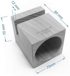 a wooden block with measurements for the top and bottom part, on a white background