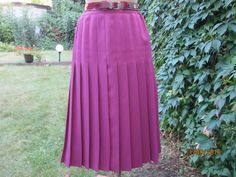 "This pretty pleated skirt vintage is perfect for 4 seasons! DETAILS: pleated skirt color: rosebrown skirt with lining fabric of skirt: polyester zipper in back side elastic waist fabric of lining: polyamide 🔹CONDITION: excellent Measurements lying flat are: Lenght: 29\" / 73,7cm Waist: 13,8\" / 34,8cm and more - skirt with side elastic waist Waist max: 14,5\" / 36,8cm Hips: 19,7\" / 50cm PLEASE NOTE: \"Laying flat\" means that waist  and hips NEED TO DOUBLED Size on tag: EUR / UK12, but refer to measurements. Belt in photo is not included. 🔹 SHIPPING:  I ship worldwide and I use priority registered mail. Estimated time of delivery for Europe: 5-10 business days/ for US: 10- 15 businesses days. 🔹 RETURNS: as this is a vintage item I do not accept returns, however if there's an issue, co Formal Pink Pleated Skirt, Vintage Full Skirt With Accordion Pleats, Retro Pleated Work Skirt, Retro Pleated Skirt For Work, Vintage Accordion Pleats Skirt For Fall, Vintage Full Pleated Skirt, Relaxed Fit, Vintage Relaxed Full Pleated Skirt, Vintage Full Pleated Skirt, Vintage Style Midi Pleated Lined Skirt