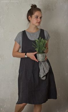 "Our linen apron pinafore dress is made of high-quality linen fabric. Rounded neckline, deep armholes, side seam pockets. It is a very simple and yet feminine pinafore dress. it can be your best friend when you are in a kitchen, garden, or even in your art studio, it protects your clothes and looks beautiful at the same time. -- ABOUT THE ITEM -- * 100% pure linen is prewashed to avoid shrinkage * Color is shown: NATURAL FLAX (medium); LIGHT GREY (medium); CHARCOAL (medium) * deep armholes * Sco Linen Apron Pinafore, Linen Apron Dress, Linen Pinafore, Summer Linen Dresses, Scoop Neck Dress, Dress Order, Linen Short, Linen Tunic, Apron Dress