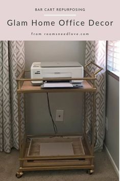 a table with a printer on top and the words glam home office decor above it