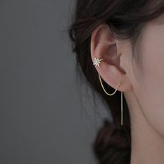 These earrings will come as shown as in pictured. Ear Cuff earrings good for casual use or events. These dainty set is a lovely gift idea for someone special. They are selling as a PAIR. 𝐂𝐚𝐫𝐞 𝐢𝐧𝐬𝐭𝐫𝐮𝐜𝐭𝐢𝐨𝐧𝐬 To maintain quality and color, keep jewelry away from water, moisture, chemicals, etc. and handle with clean hands. I also recommend occasionally cleaning the item with a cloth and storing it in a clean place such as a sealed bag or compartment. Ear Cuffs Silver, Ear Cuffs Gold, Gold Ear Cuffs, Silver Ear Cuffs, Ear Cuff Chain, Earring Cuff Chain, Chain Threader Earrings, Gold Ear Cuff, Star Chain