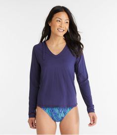 We designed this high-performance swim cover-up to offer plenty of coverage, comfort and style for a day of fun in the sun. This casual hooded top is ultra-versatile and perfect over your swimsuit at the beach or with shorts on the way home. Falls at hip. Relaxed Fit: Our most generous fit sits farthest from the body. UPF 50+ rated fabric blocks at least 97. 5% of the sun's UV rays - 10x more than a white cotton tee. Lightweight and breathable, the ultrasoft fabric dries quickly, wicks moisture Fabric Blocks, Active Swimwear, Beach Cover Ups, Active Outfits, Hooded Top, The Way Home, Fun In The Sun, Swimwear Cover Ups, Hooded Tops