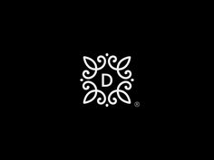 a black and white logo with the letter d in it's center, surrounded by leaves