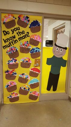 a door decorated with cupcakes and the words do you know the muffin man?