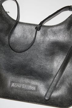 Shoulder bag is crafted from suede leather with a cracked finish and tonal Acne Studios logo patch. The platt shoulder bag presents a minimalistic silhouette with sculptural folds and a decorative removable mirror at the back. FN-WN-BAGS000331 Double Handle Shoulder Bag With Engraved Logo, Leather Tote Shoulder Bag With Logo, Everyday Leather Shoulder Bag With Logo, Modern Leather Shoulder Bag With Logo, Leather Tote Shoulder Bag With Engraved Logo, Leather Satchel Shoulder Bag With Logo, Leather Shoulder Bag With Logo, Leather Shoulder Bag With Engraved Logo For Shopping, Modern Leather Shoulder Bag With Engraved Logo