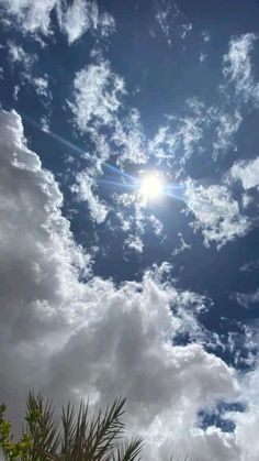 the sun shines brightly through some clouds