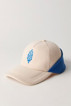 a white hat with blue trim on the side