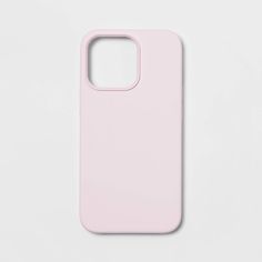 a pink phone case sitting on top of a white surface