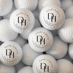 a pile of white golf balls with the letter p on them in black and white