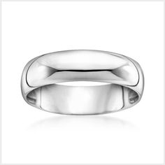 a white gold wedding ring on a white background