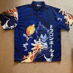 New Without Tags Vintage 2001 Dragon Ball Z Vegeta Shirt (2xl) -Never Washed Or Worn -Extra Button Included On Shirt -Original Owner -Smoke Free & Pet Free Home Create A Bundle To Save A Bundle!! Blue Short Sleeve Camp Shirt With All Over Print, Blue Camp Shirt With All Over Print, Blue Relaxed Fit Camp Shirt With All Over Print, Blue Collared Shirt With All Over Print, Blue Printed Shirt For Streetwear, Blue Relaxed Fit Camp Shirt With Print, Blue Collared Camp Shirt With All Over Print, Blue Collared Camp Shirt With All-over Print, Fitted Blue Shirt With All Over Print