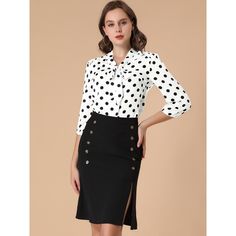 A dash of soft fabric enhances the light and airy feel of this billowy polka-dot blouse. Cute and nice, this blouse features polka dots, a bow-tie neck, ruffle shoulders, 3/4 sleeves, elastic cuffs, hip length, and a regular fit. With a sweetly spotted and gracefully ruffled shoulder, this bow-tie-neck top is a charming addition to any look. Laden with ladylike charm, this lovely blouse is scattered with stylish dots just right. Simple and vintage, the design of the tie-neck lends an elegant tou Polka Dot Long Sleeve Blouse With Button Closure, Polka Dot Long Sleeve Blouse For Work, Long Sleeve Polka-dot Blouse With Button Closure, Polka Dot Blouse For Office In Fall, Elegant Polka Dot Blouse For Work, Polka Dot Blouse With Button Closure For Workwear, Chic Polka Dot Blouse For Workwear, Feminine Long Sleeve Polka Dot Blouse, Feminine Blouse With 3/4 Sleeve For Workwear