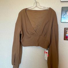 Still New. Deep Plunge Long Sleeves Crop. Chic V-neck Crop Top For Fall, Brown V-neck Crop Top For Fall, Brown V-neck Crop Top, V-neck Tops For Fall Day Out, Brown V-neck Crop Top For Spring, Cider Tops, Round Collar Shirt, Sheer Black Shirt, Wrap Tank Top