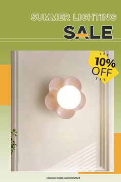 an advertisement for a summer lighting sale with a flower shaped light fixture on the wall