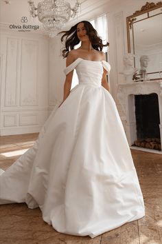 Off-the-shoulder boat neckline puff skirt satin romantic classy elegant wedding dress with long train Princess Balloon, Wedding Dress With Long Train, Dress With Long Train, Puffy Wedding Dresses, Princess Balloons, Olivia Bottega, Puff Skirt, Satin Bridal Gowns, Skirt Satin