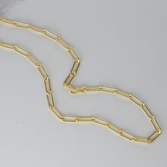 Very trendy at the moment - paperclip necklace. It's dainty and great layered or alone. Made of 925 Sterling Silver Plated in a THICK plating of 14k Gold for a piece that will last you years to come 16" Chain + 2.5" Extension chain Lobster Clasp Closure Nickel-free and hypoallergenic Thickness: 3.7mm Opal Stacking Ring, Sterling Silver Opal Ring, Paperclip Necklace, Necklace Gold Chain, Gold Bar Earrings, Dainty Hoop Earrings, Silver Opal Ring, Chain Necklace Gold, Simple Stud Earrings