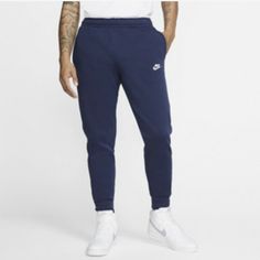 Nike Club Joggers Buy Now: $49.00 Condition: New W/ Tag Authentic: 100% Style Code: 826431 451 Color: Navy Size: X-Large Quietly Stunning. Universally Loved. Among Its Many Feats, One Thing Nike Does Especially Well Is Bold Simplicity, And The Nike Men’s Club Joggers Are The Perfect Example. These Joggers Sport No-Frills, Simple, And Understated Branding With A Classic Look Yet They Manage To Be Eye-Catching And Stylish Through Cut And Design Alone.\\ **Please Do Not Send “What Is Your Lowest Pr Nike Navy Bottoms For Streetwear, Nike Navy Loungewear Bottoms, Nike Navy Bottoms For Loungewear, Navy Nike Bottoms For Loungewear, Nike Navy Cotton Bottoms, Navy Cotton Nike Bottoms, Nike Joggers Mens, Mens Nike Sweatpants, Nike Grey Sweatpants