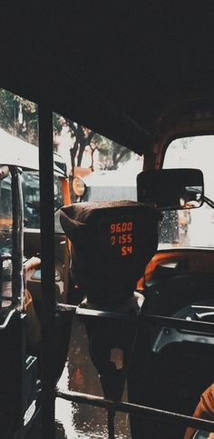 a parking meter sitting on the back of a truck