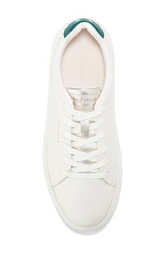 This sleek leather sneaker with clean lines inspired by classic tennis styles has rubber caps at the toe and heel for added traction. Round toe Lace-up style Removable cushioned footbed Leather upper/textile lining/synthetic and rubber sole Imported Classic Platform Sneakers With Embossed Logo And Lace-up, Classic Platform Sneakers With Embossed Logo, White Sneakers With Embossed Logo For Spring, Spring White Sneakers With Embossed Logo, Classic White Lace-up Platform Sneakers, White Low-top Platform Sneakers With Rubber Heel Cap, Sporty White Platform Sneakers With Rubber Heel Cap, White Lace-up Platform Sneakers With Rubber Heel Cap, Up Styles