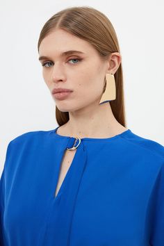 Sophistication Exudes From This Blouse, Crafted From Soft Crepe That Drapes The Bodice With A Keyhole Tie Detail. Finished With Long Batwing Sleeves, Pair This Piece With Tailored Pants For Smart Workwear.Keyhole Tie Detaillong Sleevescrepe