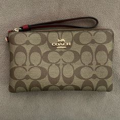 Brand New, Never Used. Comes With Charms And Box. Trendy Coach Clutch As Gift, Coach Rectangular Wristlet With Zipper Pouch, Chic Coach Rectangular Wristlet, Trendy Coach Rectangular Clutch, Chic Rectangular Coach Wristlet, Trendy Rectangular Coach Clutch, Coach Rectangular Clutch With Zipper Closure, Coach Rectangular Clutch With Wrist Strap, Bags Coach