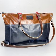 Our Everyday Collection of handbags reflects our task, offering tried + true styles + combinations that are timeless + classic. Colors + sizes to keep up with your effortless style + quality that holds up to your everyday adventures. Bring style back to business with The Brief. Featuring a large interior pocket on one side, this briefcase is perfect for anything from your laptop to “old school” folders. An adjustable cross body strap and two signature pockets on the other side complete this vers School Folders, Back To Business, Bison Leather, Everyday Adventures, Summer Jeans, Shoulder Tote, Keep Up, Timeless Classic, High Quality Leather