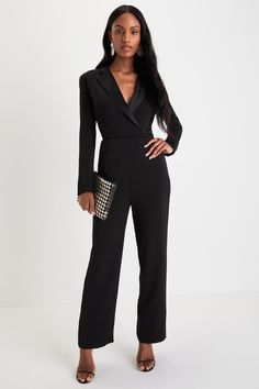 You'll stun the Lulus Impressive Presence Black Collared Straight Leg Jumpsuit! Lightweight flat woven fabric shapes long fitted sleeves that frame a darted bodice with a collared neckline and peaked satin lapels. Wrap-inspired design features a slender strap and a gunmetal-toned horsebit clasp at the fitted waist. Front diagonal pockets accent straight legs as they fall to ankle-length hems. Hidden zipper/clasp at back. Fit: This garment fits true to size. Length: Ankle length. Size medium meas