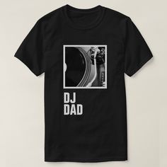 Are you looking for a cool DJ gift for your Dad? Or someone special in your life. Well, perhaps this custom photo DJ T-shirt with a classic turntable may be the best gift. Customize the text and graphic to your liking. Add graphics and text as well. Dj Shirts Ideas, Dj Tshirt Design, Pre-shrunk Black Music-themed T-shirt, Black Music-themed T-shirt For Streetwear, Father's Day Graphic Print T-shirt, Father's Day Unisex Graphic T-shirt, Father's Day Band Merch T-shirt With Short Sleeves, Father's Day Band Merch T-shirt, Black Music-themed T-shirt With Letter Print