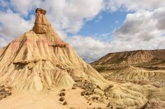 the desert is covered in many different colored rocks